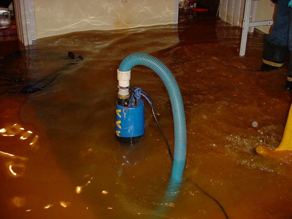 Standing water cleanup in a flooded basement